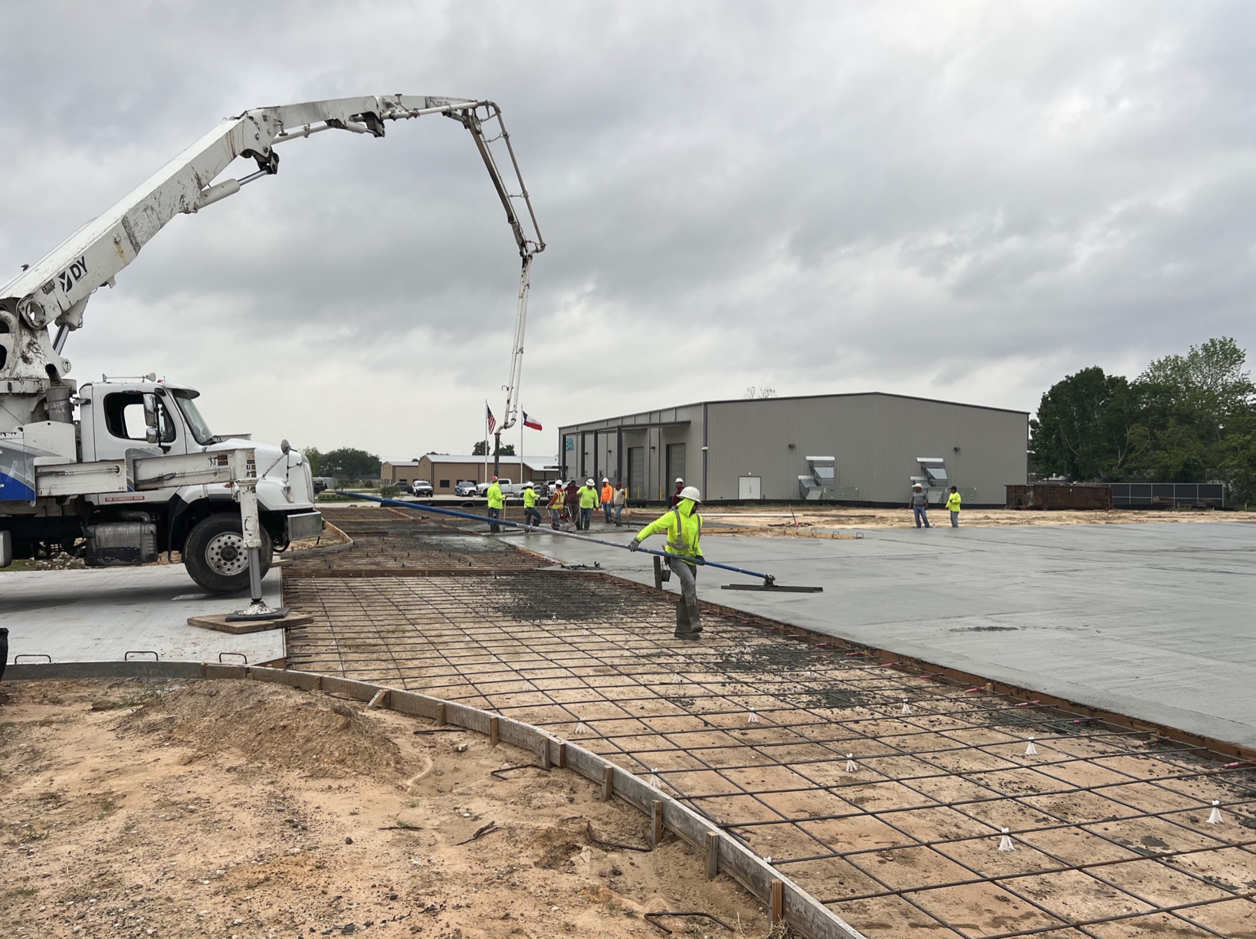 Commercial concrete pour and crew working on site