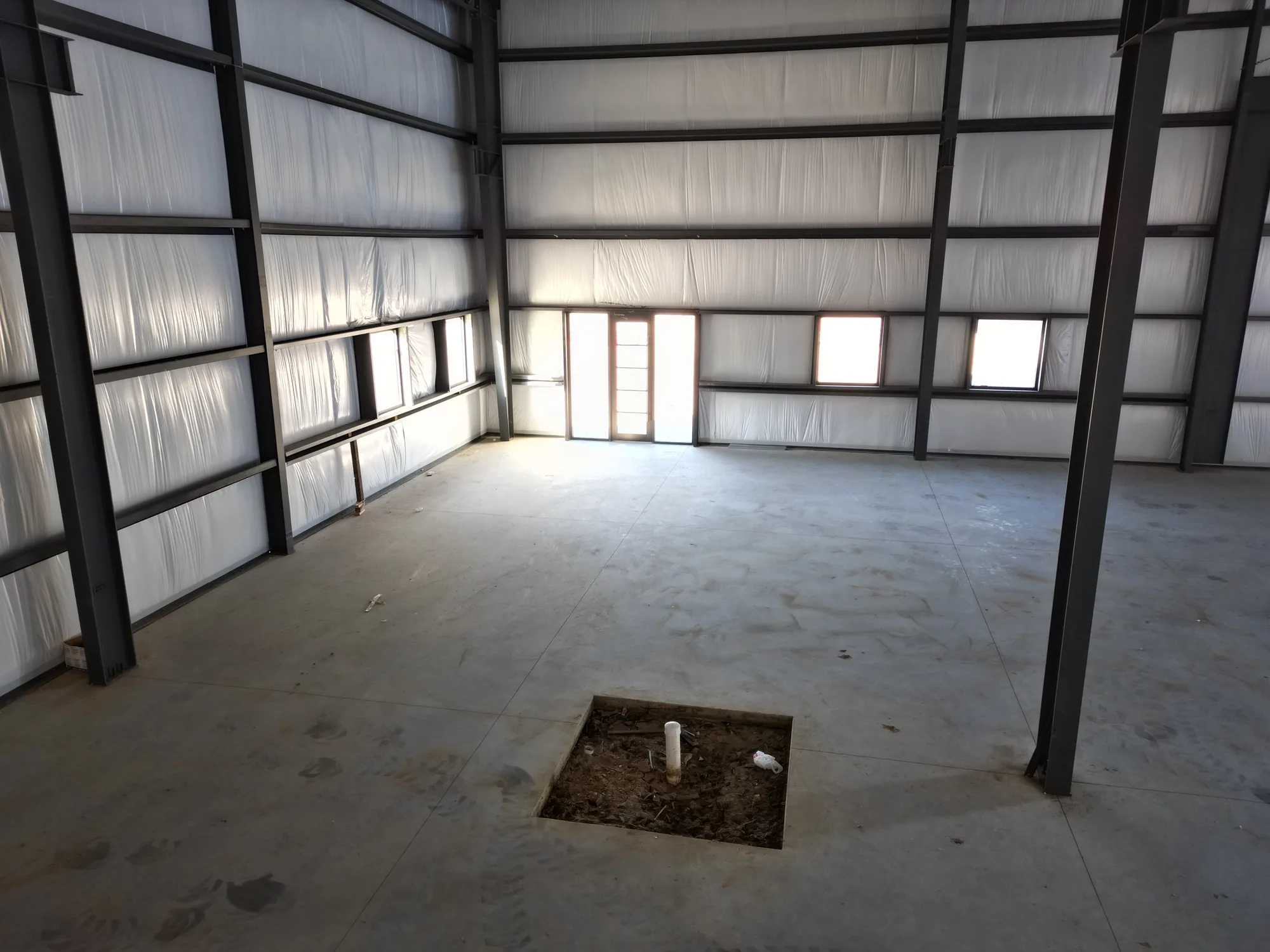 Open interior of an industrial metal building